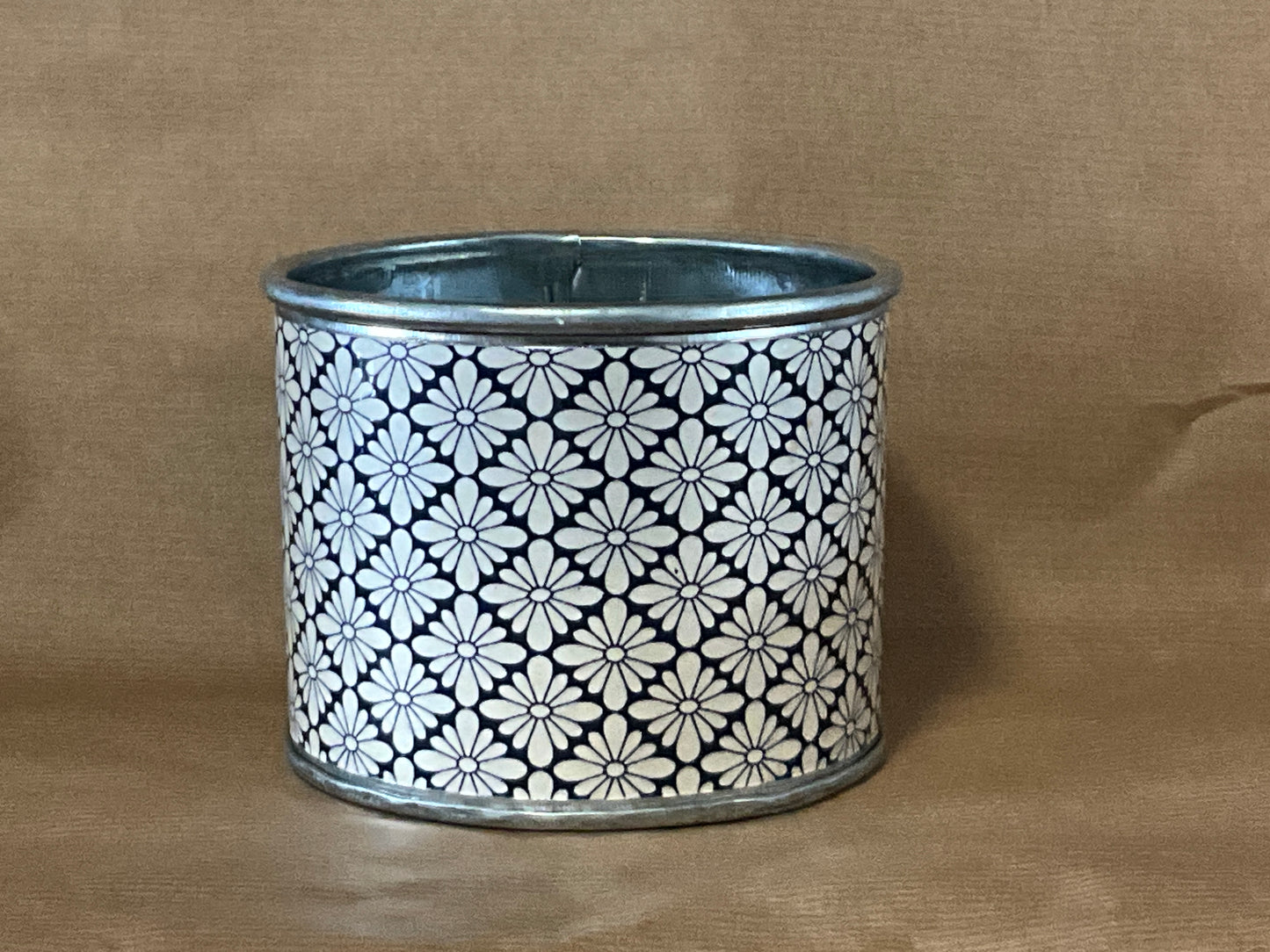 Small floral tin